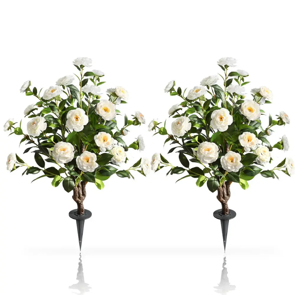 2 pack 36 inch artificial white camellia spike trees side by side showing pristine white blooms and narrow upright form