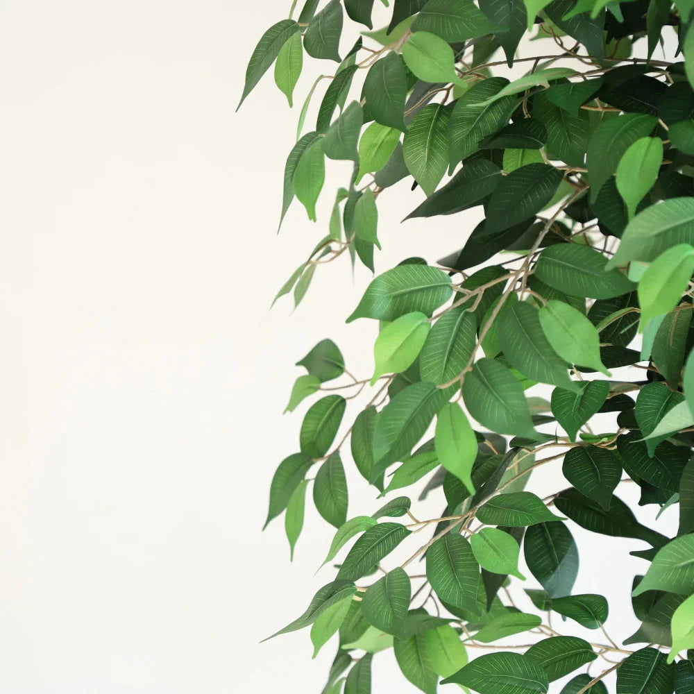 pair of 70 inch faux topiary ficus trees flanking large double front entrance doors creating grand formal welcome