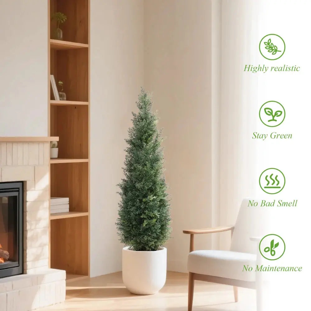 single 49 inch tall faux cedar topiary tree with tapered pyramid form and layered evergreen branches from base to tip