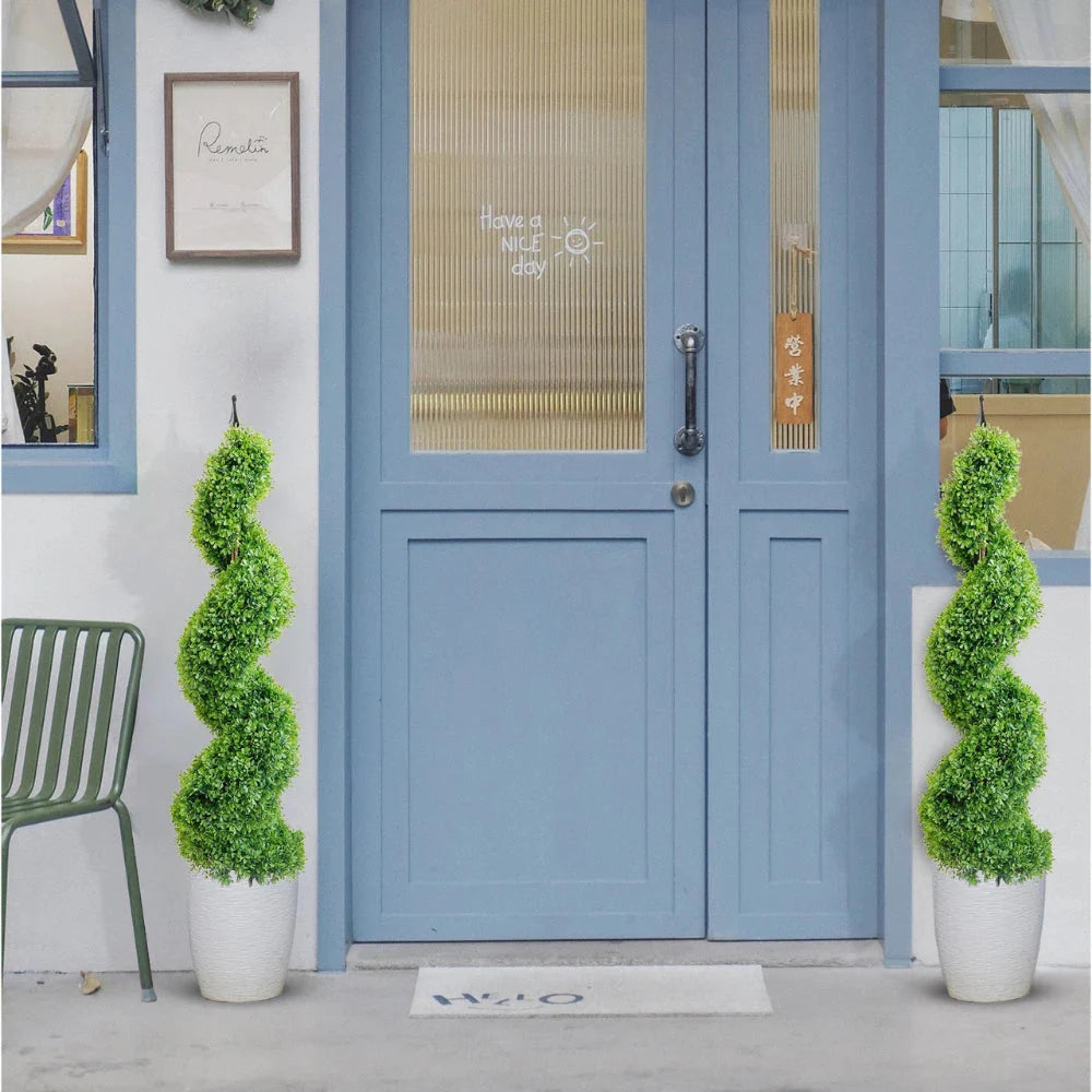 pair of 43 inch elegant faux boxwood spiral trees flanking front entrance door for sophisticated formal welcome
