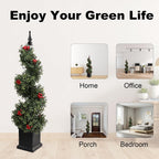 twisted spiral trunk of boxwood topiary with small red berry accents woven through green foliage