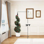 red berry spiral topiaries in living room corners with Christmas tree and gifts for festive indoor decor