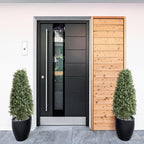 pair of 3 foot boxwood pyramid topiaries flanking front entrance door for classic formal welcome