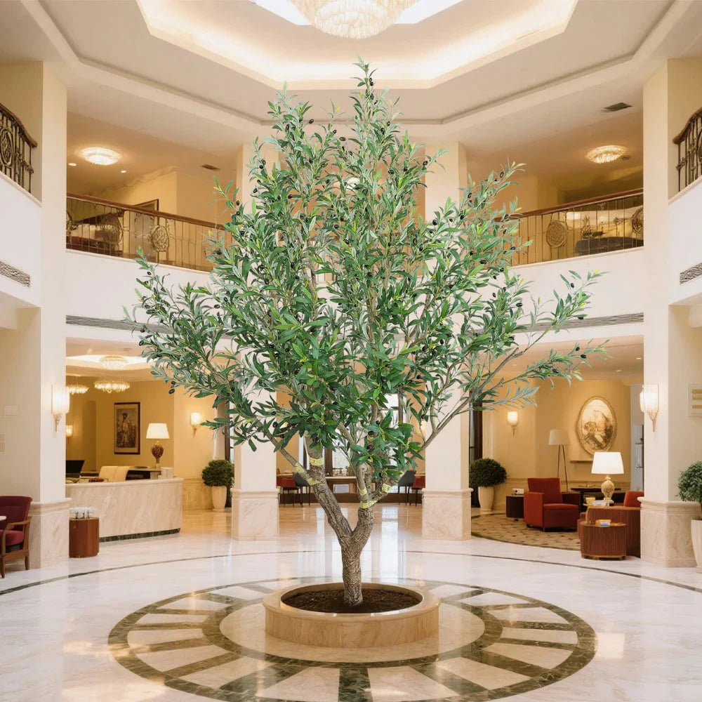 detailed view of silvery-green olive leaves on 8.2 foot faux tree with matte finish and natural vein patterns