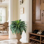 cascading fronds of 48 inch faux fern plant trailing downward demonstrating length and fullness for hanging baskets