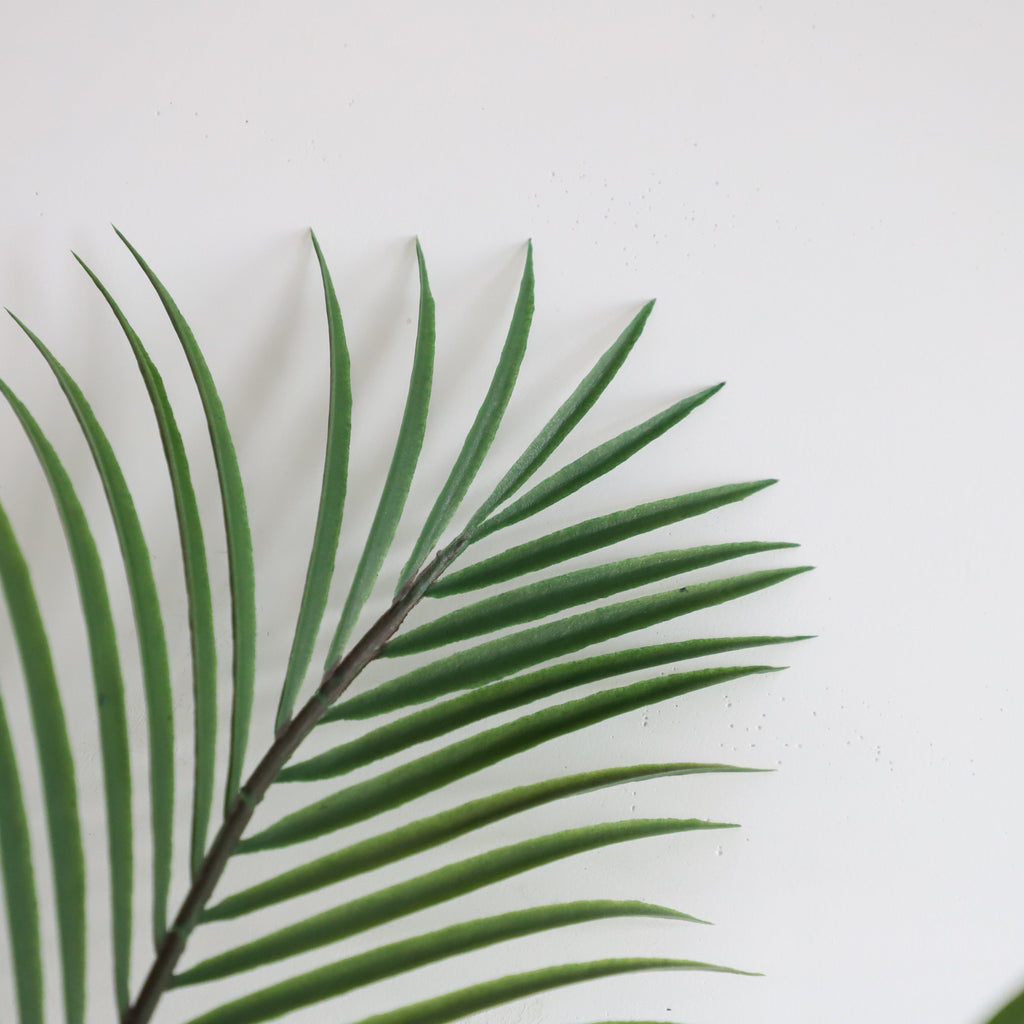 71 inch faux areca palm in open plan office lounge area adding greenery to professional workspace