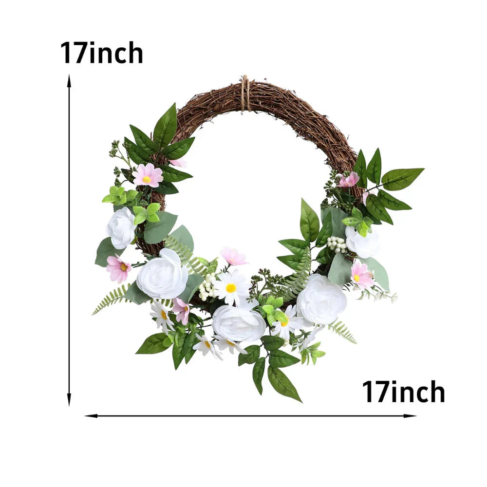 artificial wreath hanging on window over kitchen sink with natural light filtering through for cheerful display
