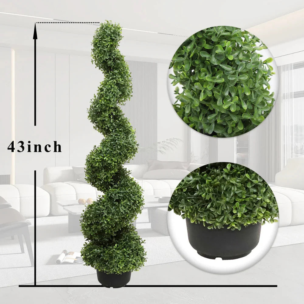 two boxwood spiral topiary trees on each side of fireplace mantel for balanced formal living room decor