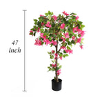 faux bougainvillea tree at restaurant entrance greeting guests with bold Mediterranean or tropical color