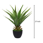 faux sansevieria on bathroom vanity counter thriving without humidity or light requirements